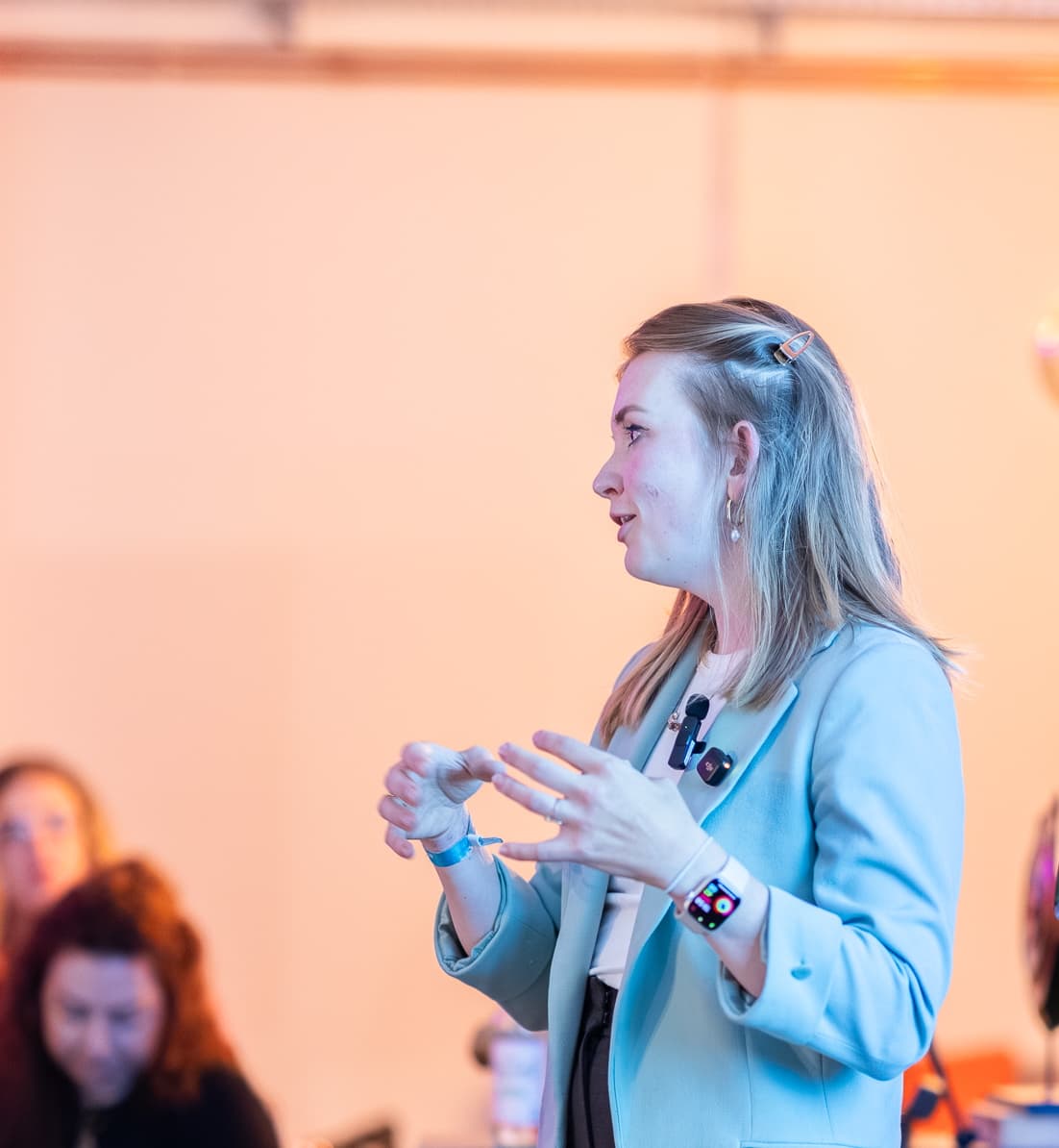 Kristina Mostovaia speaking at an event